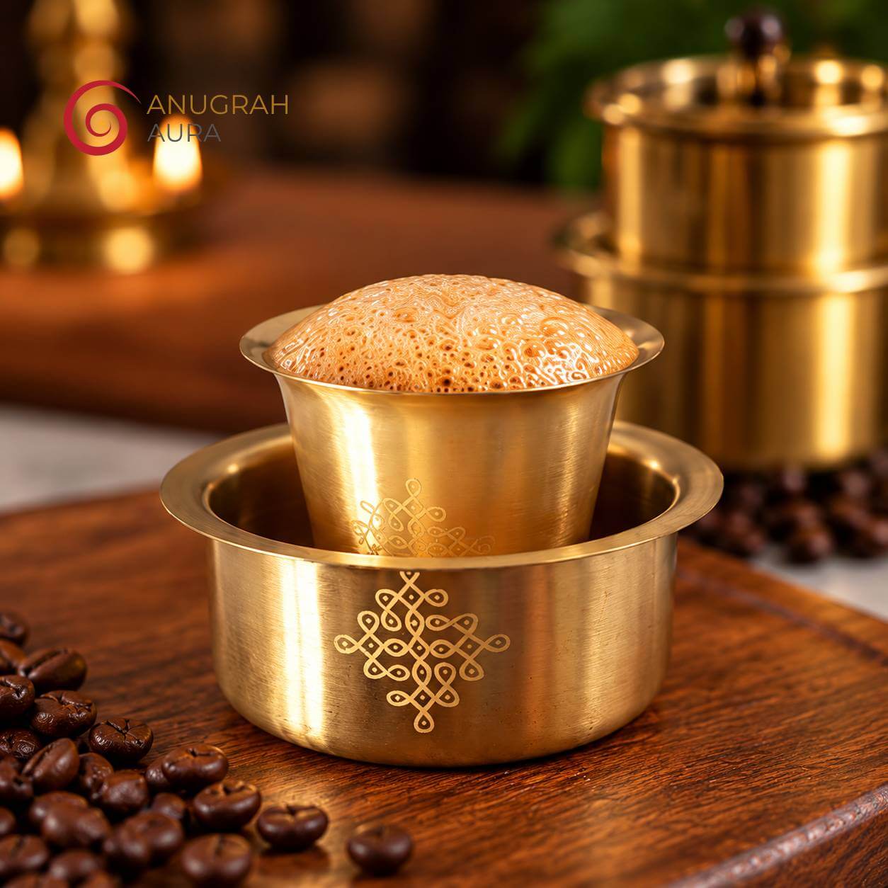 Brass coffee dabara set filled with frothy South Indian filter coffee